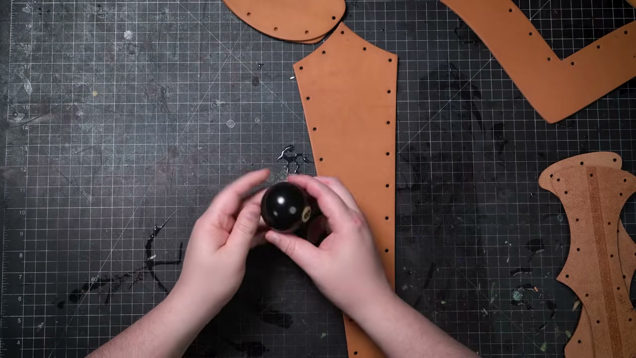 Warrior Helmet Build Guide: A Real Leather Helmet with Just a Hammer 6 Stretching a dome into damp leather over a round knob