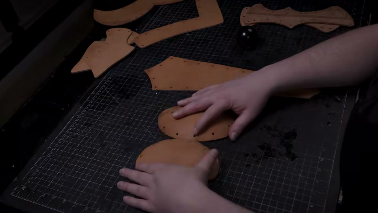Warrior Helmet Build Guide: A Real Leather Helmet with Just a Hammer 7 Cutting an edge groove along a damp helmet piece