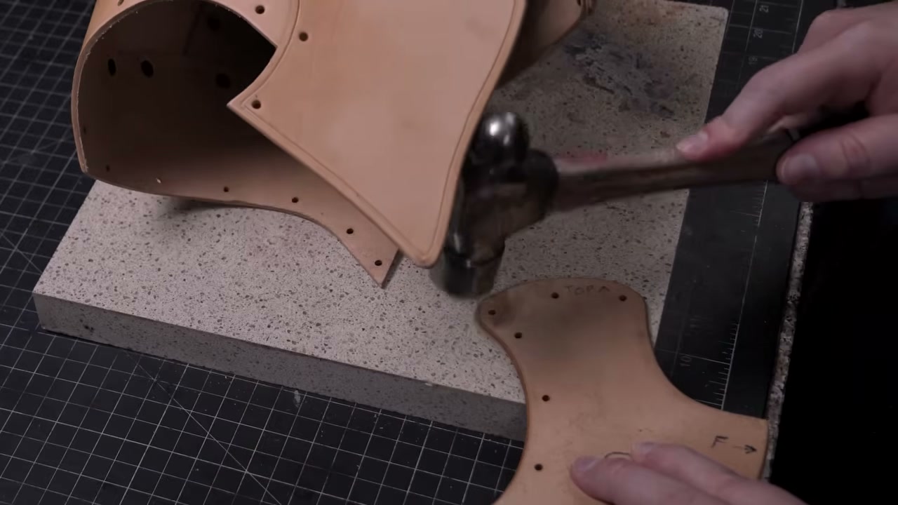 Warrior Helmet Build Guide: A Real Leather Helmet with Just a Hammer 12 Attaching a cheek plate through three leather layers