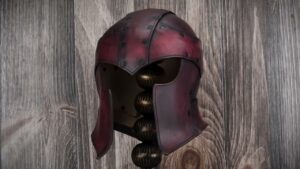 Roadmap Updates & Pre-Order Status 1 Finished oxblood Warrior Helmet on a display stand