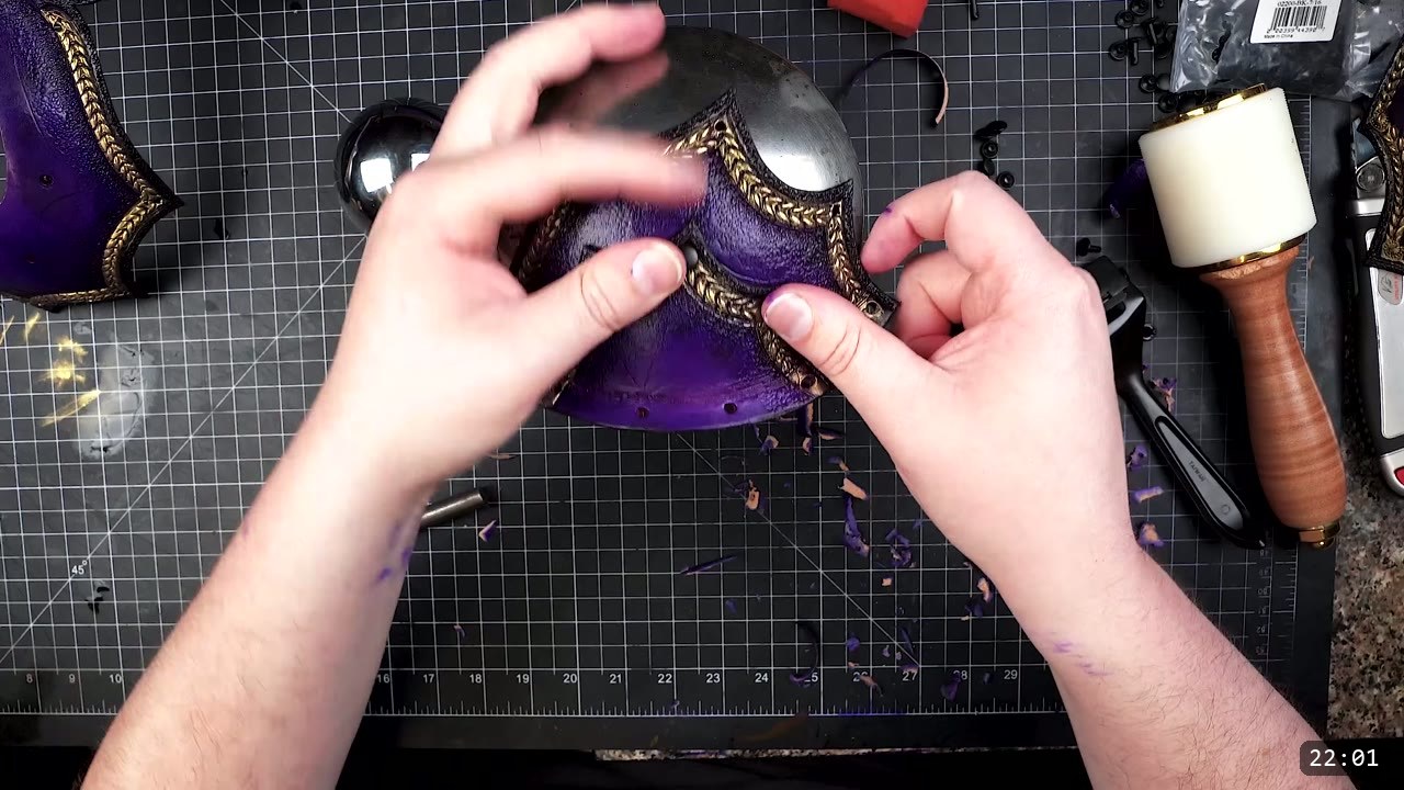 Female Leather Breastplate Build Guide: Articulated Fantasy Armor, Step by Step 14 fitting a purple and gold domed breastplate section over a steel ball form, a white nylon mallet alongside