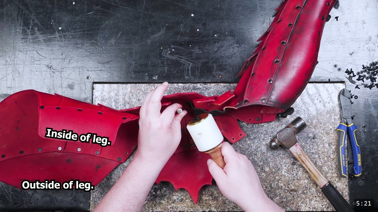 Leather Cuisses and Knees Build Guide: Articulated Upper-Leg Armor 9 setting a rivet on a red cuisse panel with a poly mallet, on-screen labels reading Inside of leg and Outside of leg