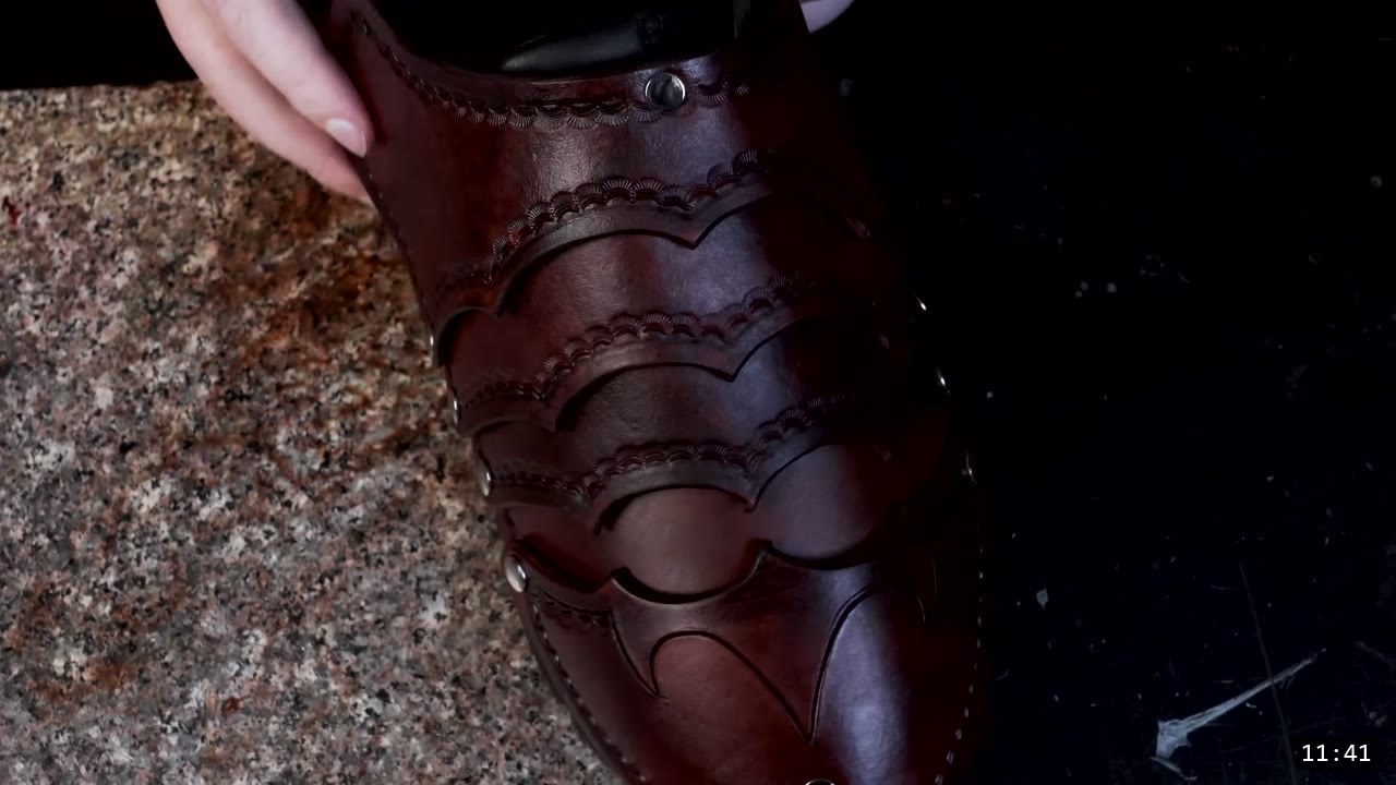 Leather Sabatons Build Guide: Foot Armor from a Flat Pattern 2 finished dark reddish-brown leather sabaton with overlapping tooled lames, each carrying a barbed toe design and a scalloped border