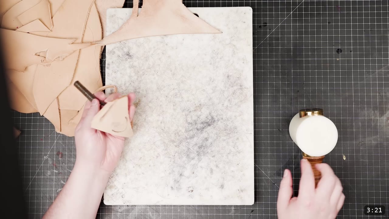 Leather Scale Armor Build Guide: A Flexible Scale Skirt from Scrap Leather 5 a wool dauber and a small dished scale worked by hand on a white marble slab beside a round dome