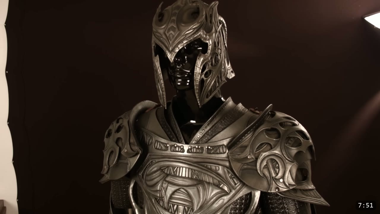 Leather Armor for Beginners: Tools You Need and How to Start 11 assembling tan leather panels with black double-cap rivets on a black poundo board over a granite slab