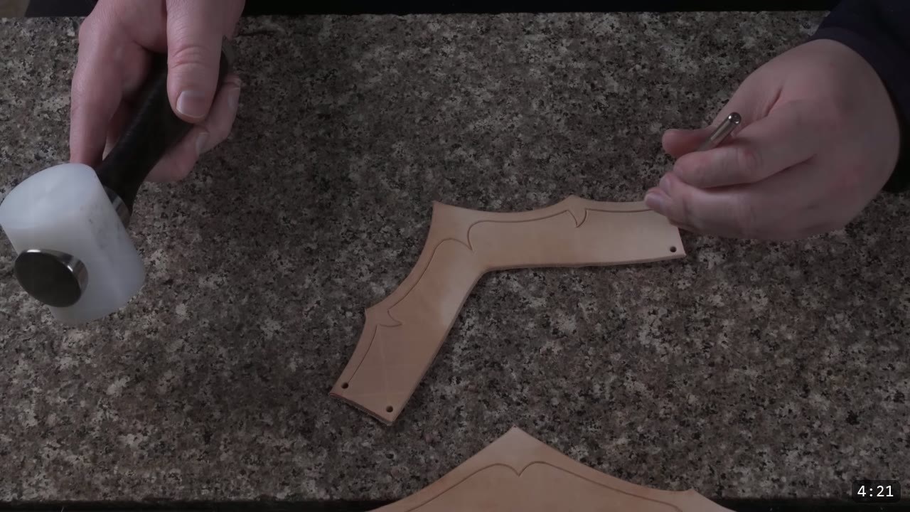Leather Armor for Beginners: Tools You Need and How to Start 8 scoring gentle curved decorative lines into two tan leather pieces with a swivel knife on a black poundo board