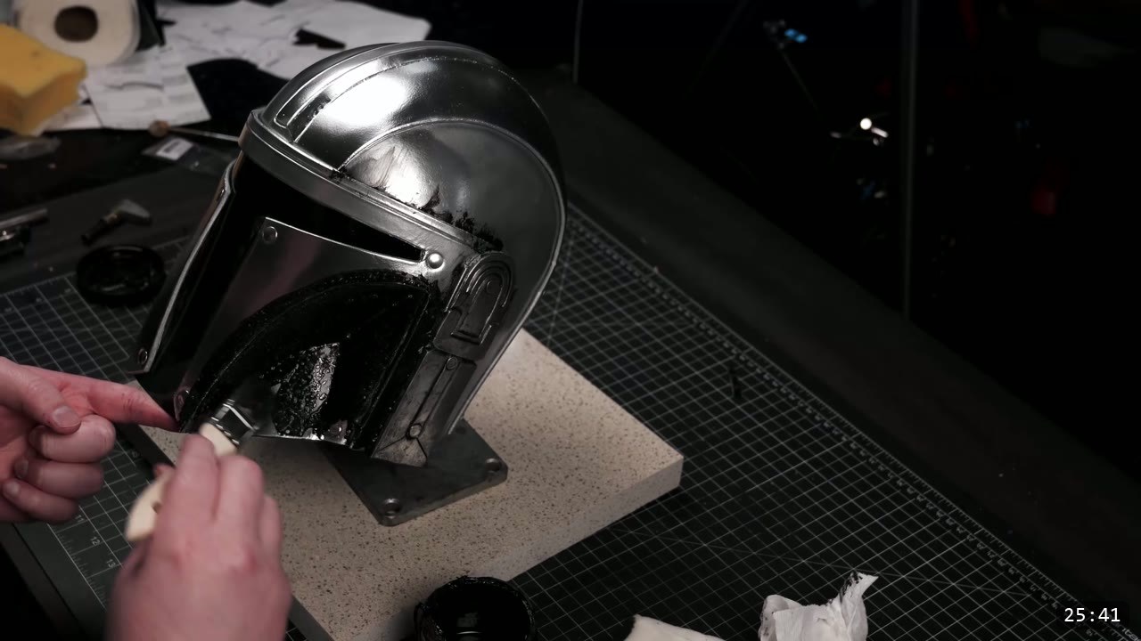 Leather Mandalorian Helmet Build Guide: Flat Pattern to Chrome Finish 3 finished leather Mandalorian helmet with a mirror liquid-chrome finish, dark tinted visor, and black antiquing in the recesses
