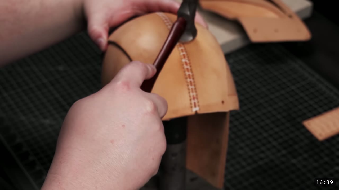 Leather Mandalorian Helmet Build Guide: Flat Pattern to Chrome Finish 10 tightening the X-pattern stitches along the helmet core seam