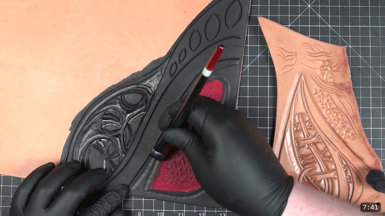 Custom Leather Armor: How I Design, Tool, and Color Test a Suit (Manticore Build) 9 a black-dyed tooled sample with red filling the geometric pockets, next to a second sample still in natural tan