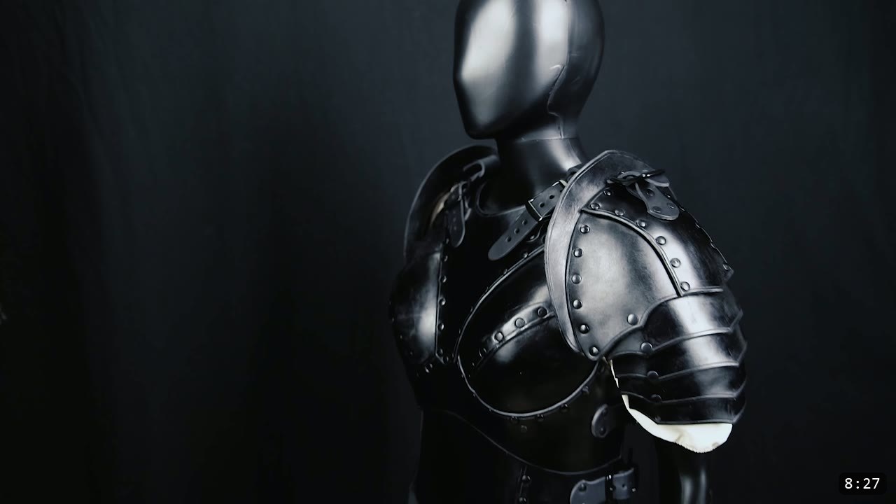 Female Leather Breastplate Build Guide: Warrior Armor from Cups to Buckles 14 the finished black leather Warrior female breastplate worn on a mannequin, with a shoulder pauldron in place